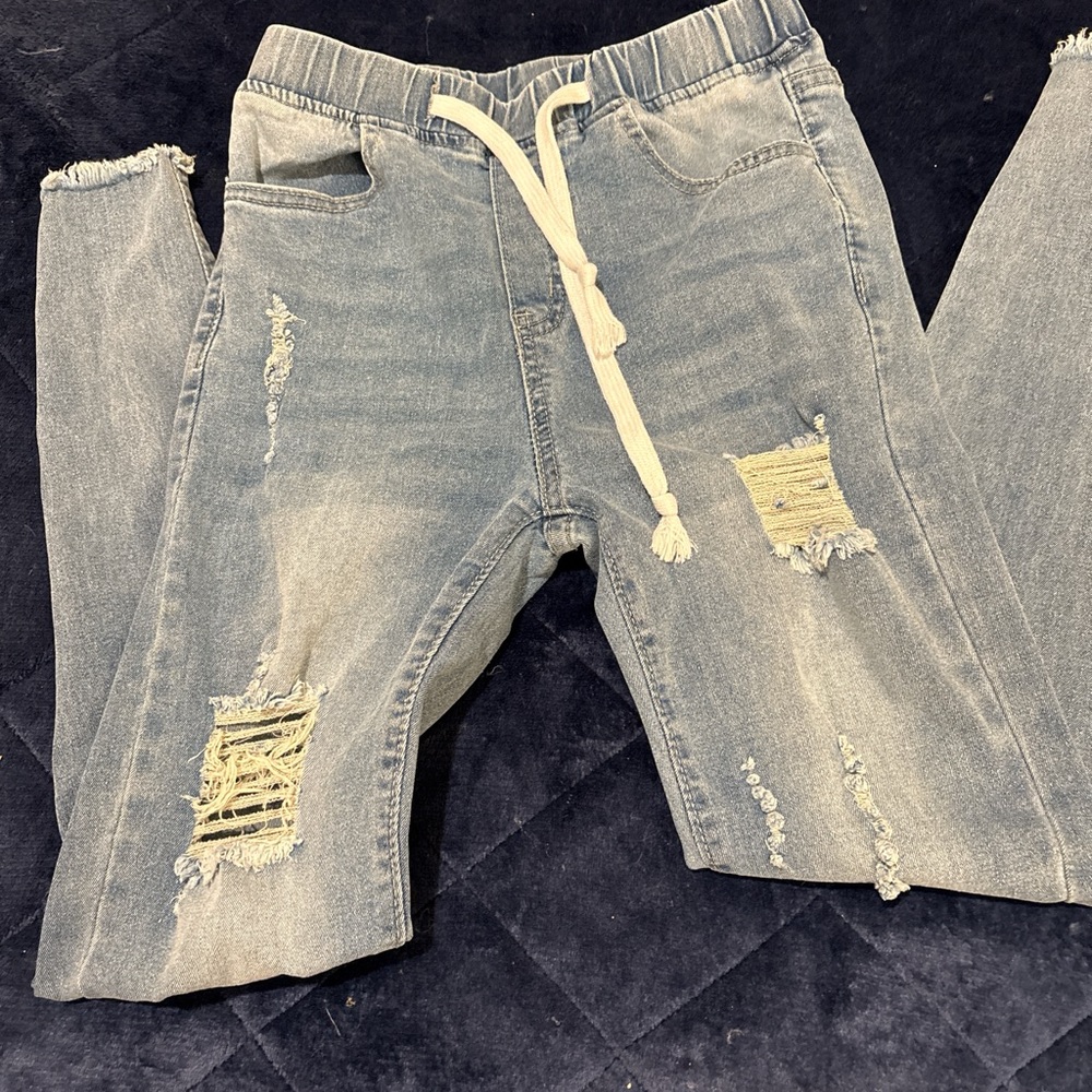 Light blue destroyed jogger jeans